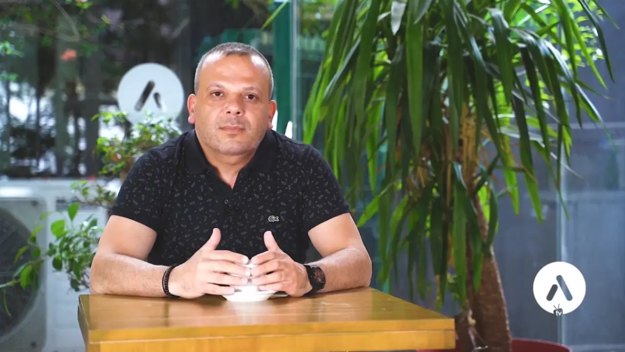 German patient sharing a video testimonial about facelift, neck lift, and double chin liposuction at AKM Clinic