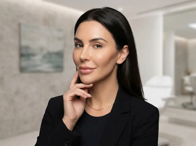Buccal Fat Removal surgery portrait showing natural-looking cheek definition and a refined lower-cheek contour in a clinical setting.
